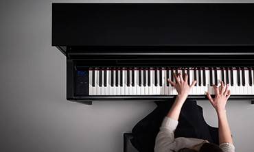 15vip太阳成Clavinova? CLP-585  荣获“红点设计大奖”